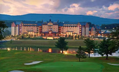 a view of a hotel with a golf course at Moonlight Mountain Lodge on Camelback Mountain! in Tannersville