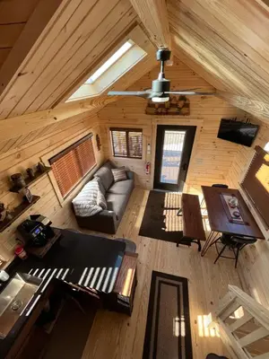an overhead view of a living room in a log cabin at Private Luxury Log Cabin in the Endless Mountains, Firepit, Farm Charm in Kingsley