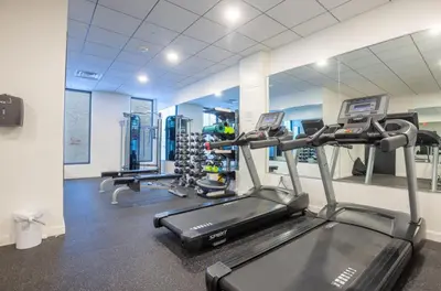a gym with two treadmills and a treadmill at Sky-view 2BD Apartment In Northern Liberties in Philadelphia