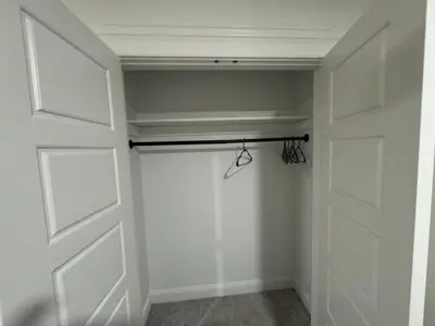 a room with a closet with a door at Farm Views - 10 min to Sight & Sound in Ronks