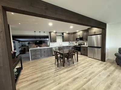 a large kitchen with a table and chairs in it at Farm Views - 10 min to Sight & Sound in Ronks