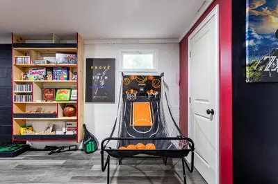 a room with a hammock in the corner of a room at Summit Retreat Hot Tub Game Room Sauna in Tobyhanna