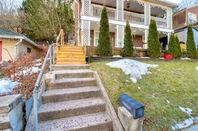 a set of stairs in front of a house at Mtn-View Balcony! All-Season Apt Near Jim Thorpe in Nesquehoning