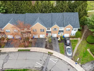an overhead view of a house with a parking lot at Comfortable Private Room with Bath Easy Transit in Piscataway