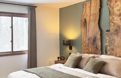 a bedroom with a bed and a window at Blackwood Cabin Pocono in Pocono Farms East