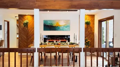 a dining room with a table and chairs at Blackwood Cabin Pocono in Pocono Farms East