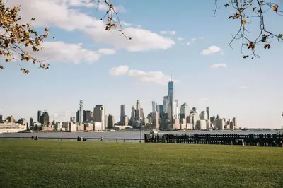 a view of a city from a park at Park Hamilton House 3B Top Floor Apt Mins to NYC in Jersey City