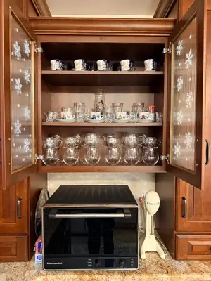 a kitchen with a microwave in a cabinet at House For Rent Near MetLife Stadium in Hasbrouck Heights