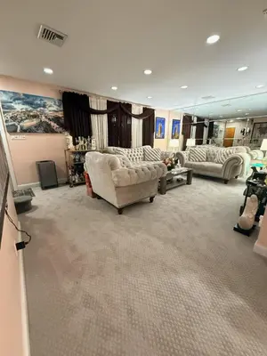 a large living room with two couches and a couch at House For Rent Near MetLife Stadium in Hasbrouck Heights