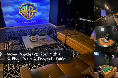 a room with a bar with couches and a television at PrivatePool|Hot tub|Sauna|HomeTheater|Backyard in Long Pond
