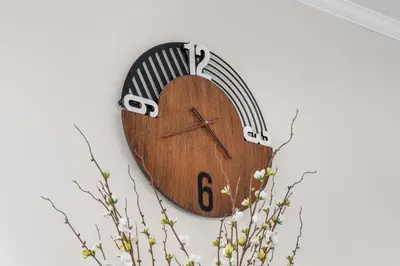 a clock is hanging on a wall at 5BR Home Minutes to NYC and FIFA 2026 Sleeps 16 in Teaneck
