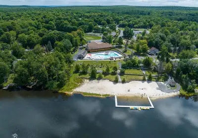 an aerial view of an island in the middle of a lake at Cozy Pocono Retreat in Tobyhanna