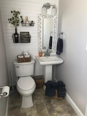 a bathroom with a toilet and a sink at Comfortable Craftsman Getaway in Lancaster