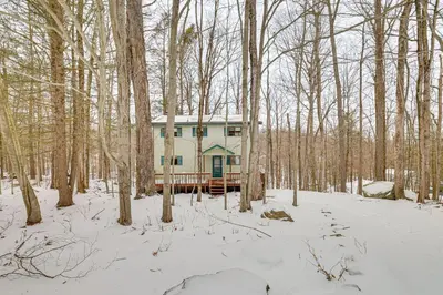 a house in the woods in the snow at Poconos Retreat in The Hideout Lake Community! in Lake Ariel