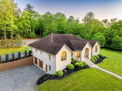 an image of a house with a yard at Blissful Mountain Getaway