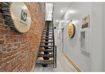 a stairway leading up to a brick wall at Center City GSN Vine 2 in Philadelphia