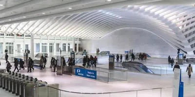 a group of people walking around an airport at VAN VORST HOUSE 2 BR Brownstone Apt Minutes to NYC in Jersey City