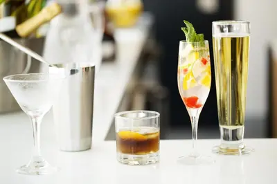 three glasses of drinks sitting on a table at Hyatt House Monroe / Cranbury / South Brunswick in Monroe Township