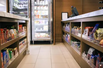 a grocery store aisle with shelves of food at Hyatt House Monroe / Cranbury / South Brunswick in Monroe Township