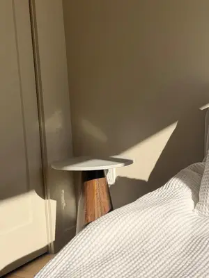 a bedroom with a bed and a lamp next to it at Luxury Catskills Sauna Retreat -Haven On The Manor in Livingston Manor