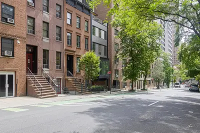 an empty street in a city with buildings at Blueground Murray Hill washer nr Bryant Park NYC-1870 in New York