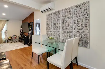 a dining room with a glass table and white chairs at Family-Friendly Home 6 Mi to Big Boulder Mtn! in Albrightsville
