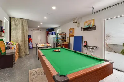 a living room with a pool table in it at Family-Friendly Home 6 Mi to Big Boulder Mtn! in Albrightsville