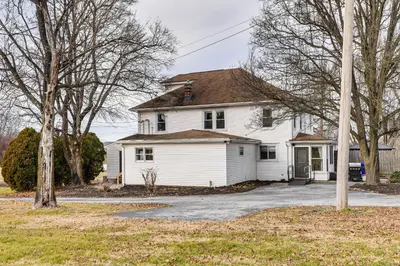 a white house with a driveway in front of it at Family-Friendly Home, 5 Mi to Roundtop Mtn Resort! in Dillsburg
