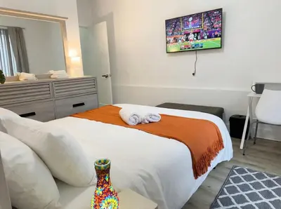a hotel room with a bed with towels on it at Furnished Private room with shared spaces in Jersey City