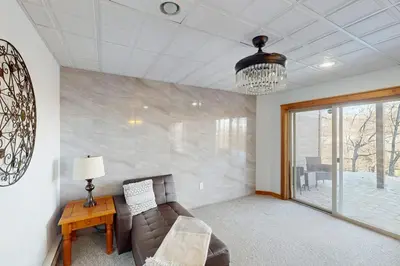 a living room with a couch and a table at Mountain View Memories at Northridge in Tannersville