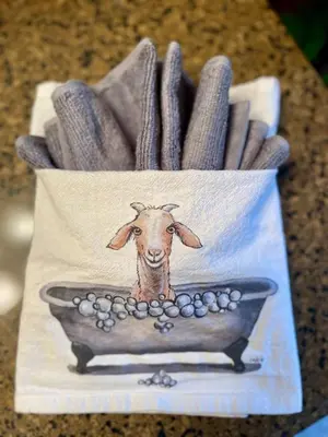 a bag with a picture of a cow in a bowl at Log Cabin at the Goat Sanctuary in Napanoch