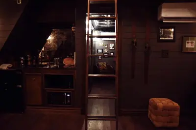 a kitchen with a counter and an oven in a room at Romantic AFrame Cabin with Firepit, BBQ in Pocono Pines