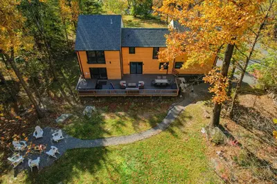 an aerial view of a house in the woods at The Luxe Lodge Escape in Tannersville