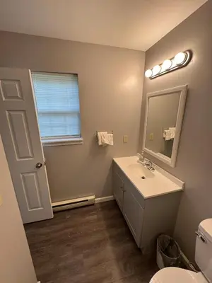 a bathroom with a sink and a mirror at Home in Poconos in Albrightsville