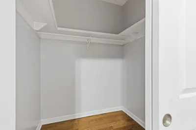 a room with white walls and a ceiling at Cozy 2BR Apartment in Jersey City with Smart Lock in Croxton