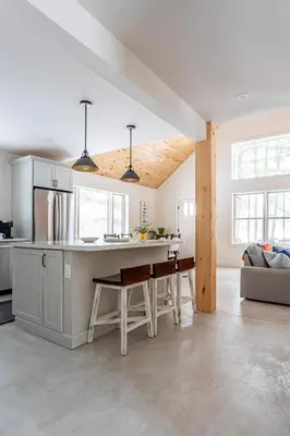 a kitchen with a kitchen island in a room at Lakefront Cabin with Private Dock Kenoza Den in Jeffersonville
