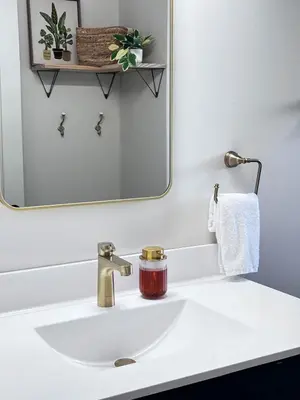 a bathroom sink with a mirror above it at Kenoza Lake Waters wLake AccessCanoeIce-fish in Callicoon