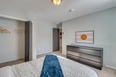 a bedroom with a bed and a dresser at Family Retreat with Game Room, 4 Mi to Kalahari! in Emerald Lakes
