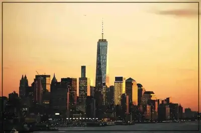 a skyline of a city with a tall skyscraper at Spacious 3BR NYC Manhattan Skyline Views Nearby in West New York