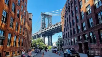 a view of a bridge from a street with buildings at 3-Bedroom 5-Beds JC Downtown 19Minutes Time Square in Jersey City
