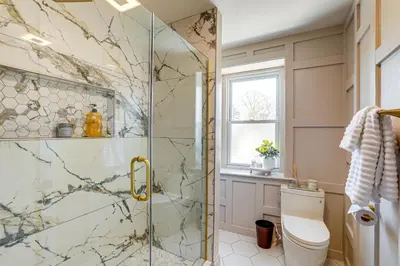 a bathroom with a shower and a toilet at Walk to Public Transit Family Home in Mount Airy! in Philadelphia