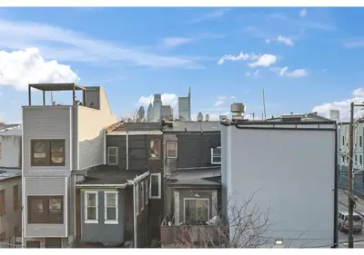 a view of roofs of buildings in a city at The Franklin institute GSN Harvest 3 in Philadelphia