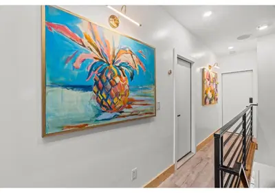 a painting of a pineapple hanging on a wall at The Franklin institute GSN Harvest 3 in Philadelphia