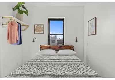 a bedroom with a bed and a window at Center city Philadelphia GSN Harvest 4 in Philadelphia