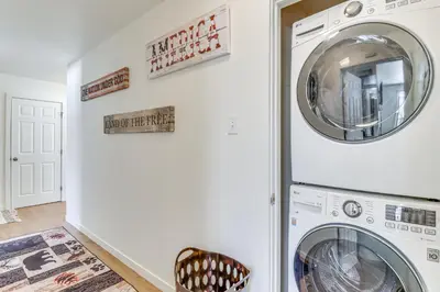 a laundry room with a washer and dryer at 1 Mi to Big Boulder Mountain Townhome with Grill in Lake Harmony