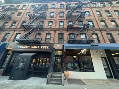 a building with a sign that reads fund sars theatre at Upper West Side Apartment 10 minutes walk From Central Park in New York