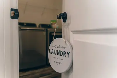 a tag hanging from a door in a kitchen at The Aerie House in Blakeslee