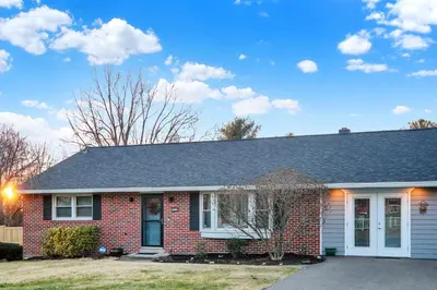 a red brick house with a gray roof at Cozy 1 bedroom house in Lititz in Lititz