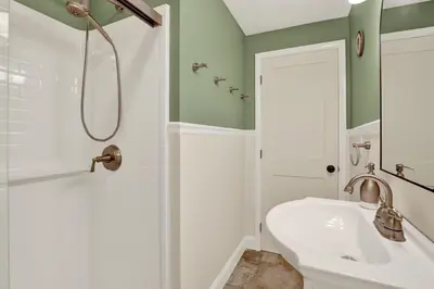 a bathroom with a shower and a white sink at Cozy 1 bedroom house in Lititz in Lititz