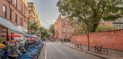 a row of bikes parked on a city street at Mott-9 Prime Soho Cozy New Studio WD in the unit in New York